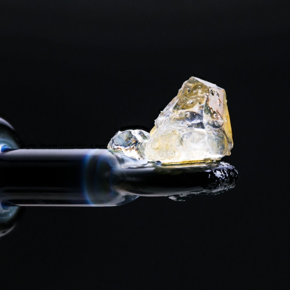 THC diamonds on a glass dab tool. Speed Greens