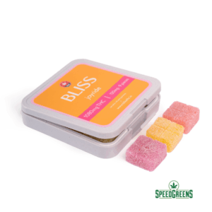 Person enjoying Bliss Joyride Gummies with music and car ride on a sunny day